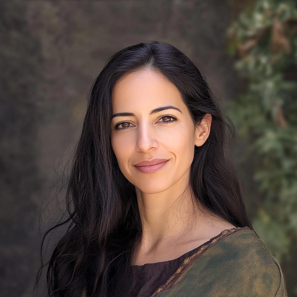 A reimagined portrait of Liat Portal created using MidJourney, featuring long dark hair, an earthy-toned embroidered shawl, and a soft, natural background with blurred greenery. A reimagined portrait of Liat Portal created using MidJourney, featuring long dark hair, an earthy-toned embroidered shawl, and a soft, natural background with blurred greenery.