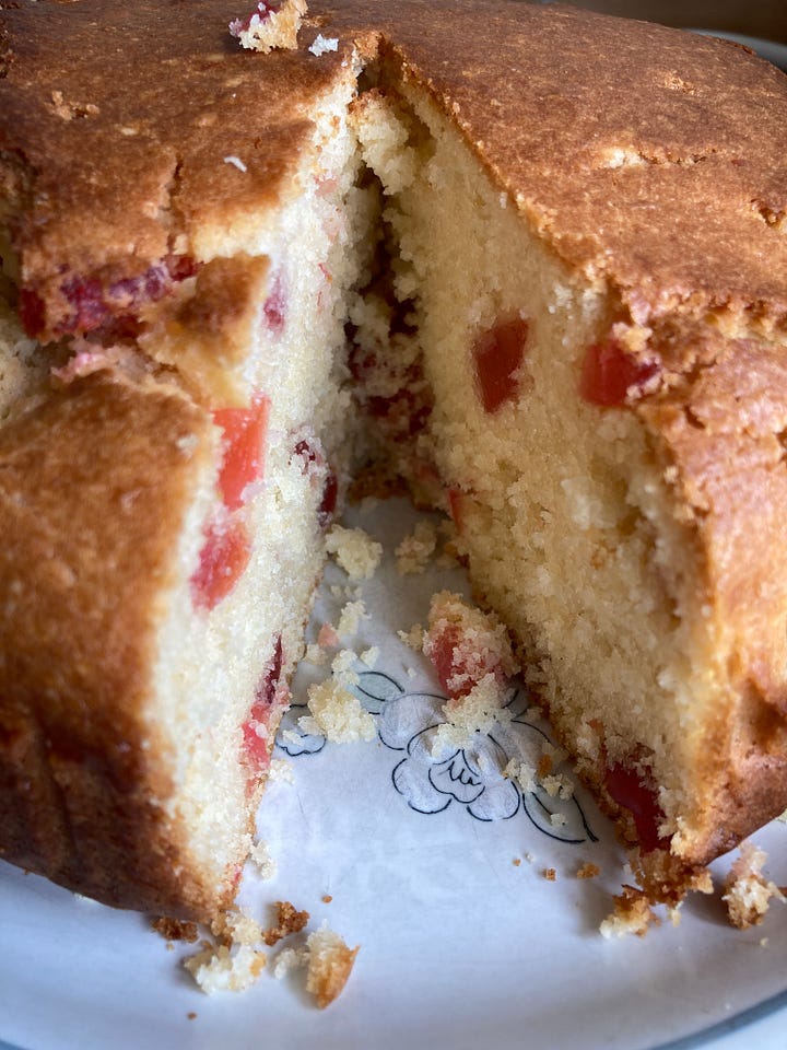 Coconut and cherry cake being made and the final slice.