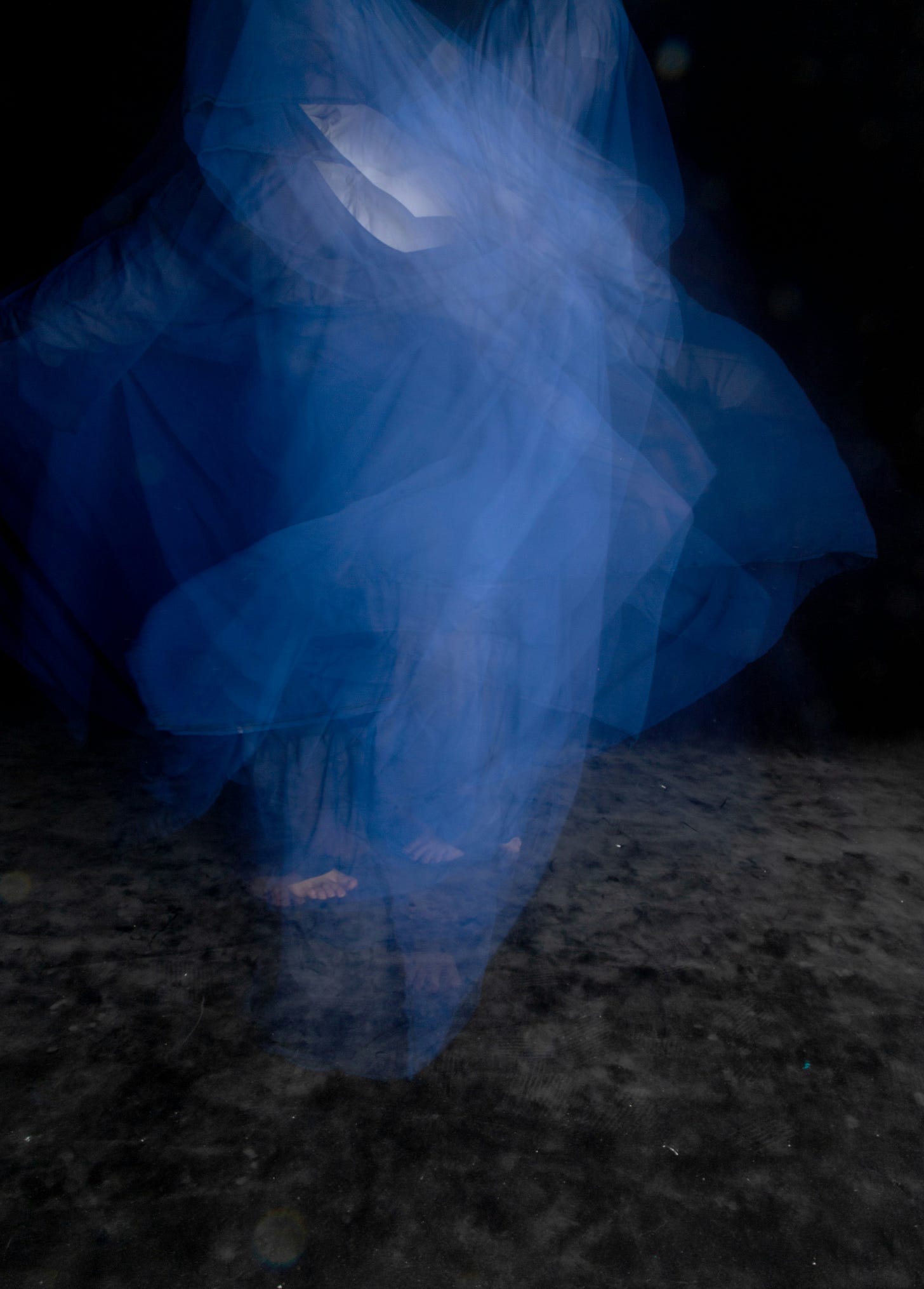 ghostly blue light in the shape of a lady ghostly blue light in the shape of a lady