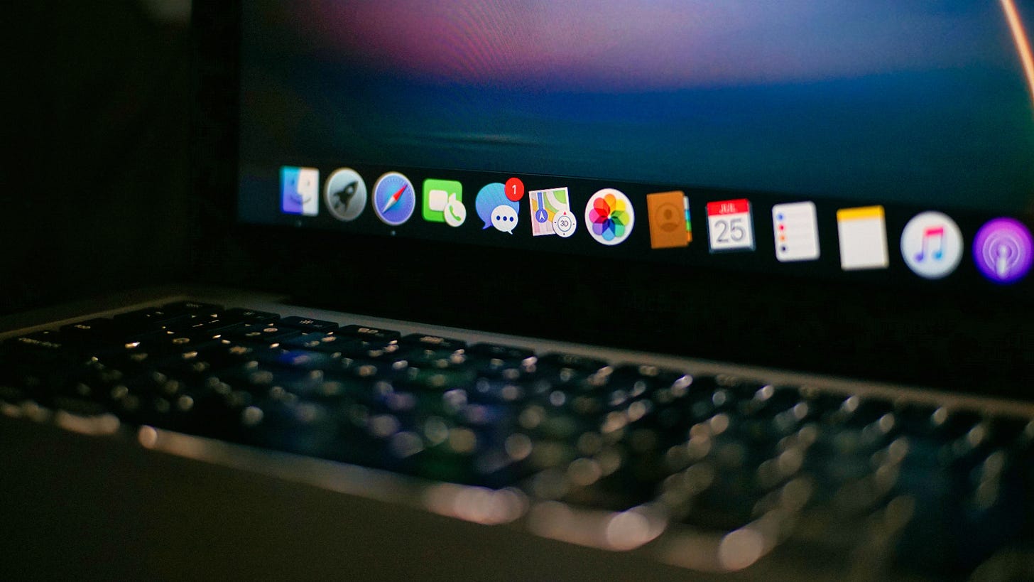 The Apple Mac Dock showing software applications The Apple Mac Dock showing software applications