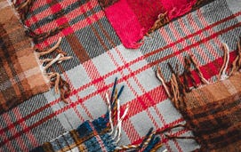 A tartan rug. A tartan rug.