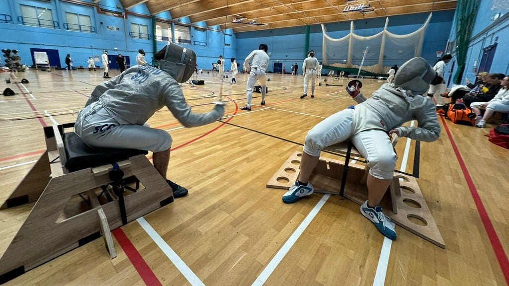 Wheelchair users take park in a fencing match