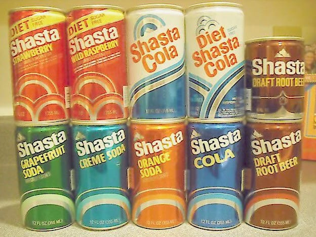 Ten cans of Shasta pop from the 1970s. It must be an old photo, because otherwise the sugar would have eaten through the aluminum cans by now. Ten cans of Shasta pop from the 1970s. It must be an old photo, because otherwise the sugar would have eaten through the aluminum cans by now.