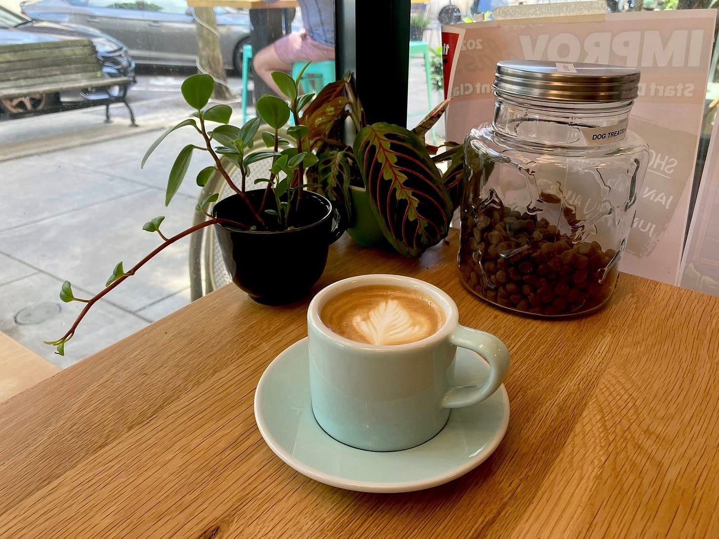 May be an image of coffee cup and coffee