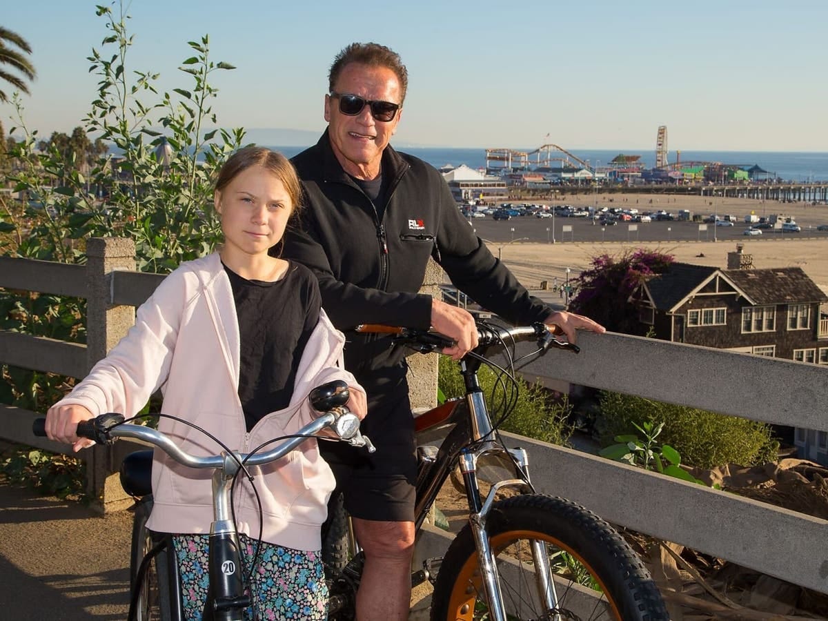Arnold Schwarzenegger goes cycling with 'friend and hero' Greta ...