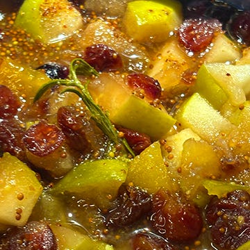 pictures of the fruit simmering on the stovetop