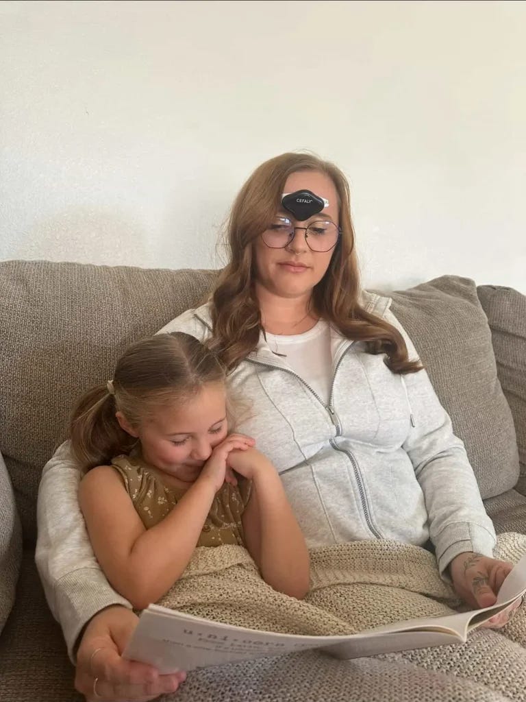 Mind Wave Wellness Client sitting with her daughter