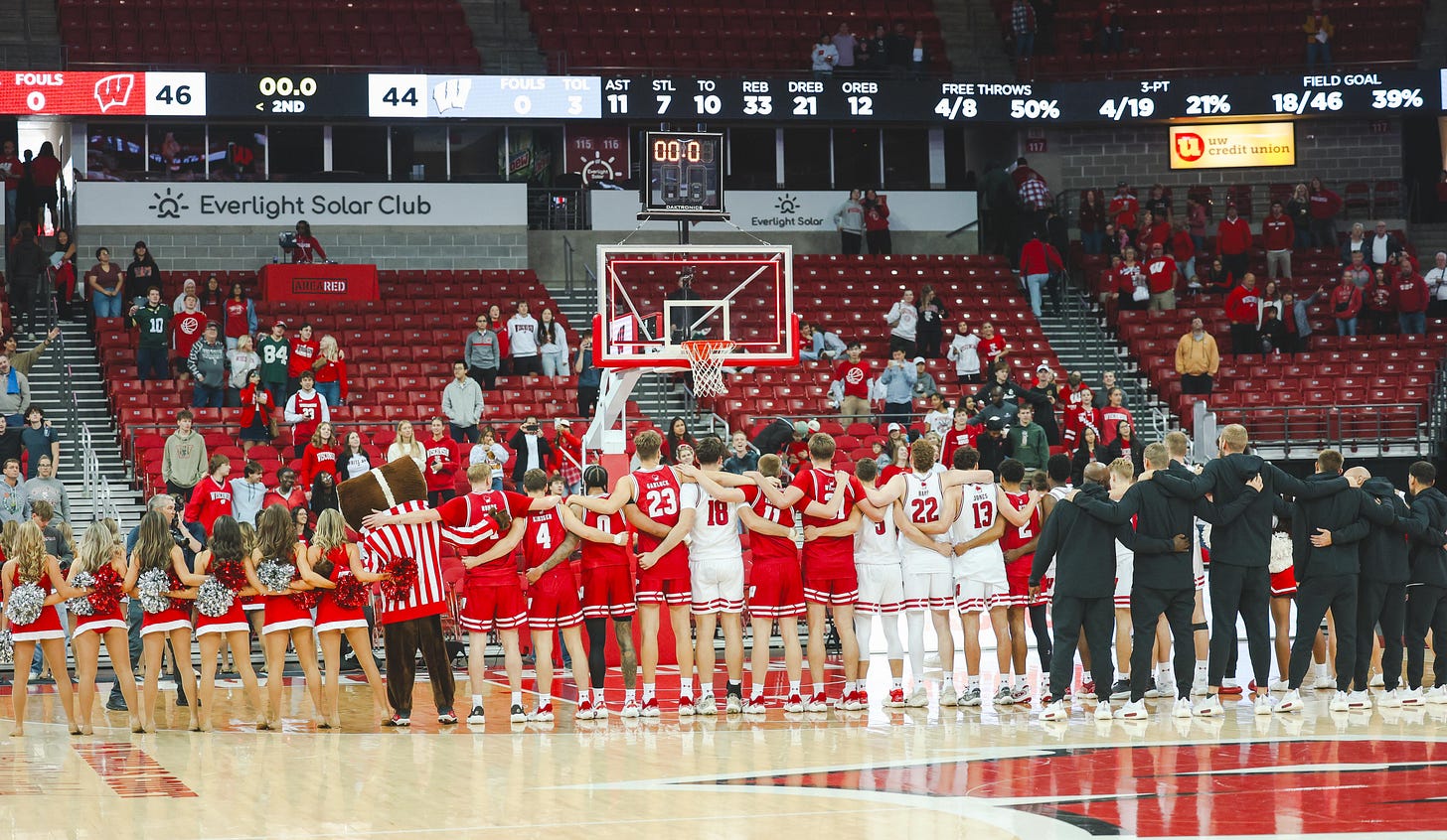 The Wisconsin Badgers assemble at the end of the 2025 Red-White Scrimmage to sing ‘Varsity.’