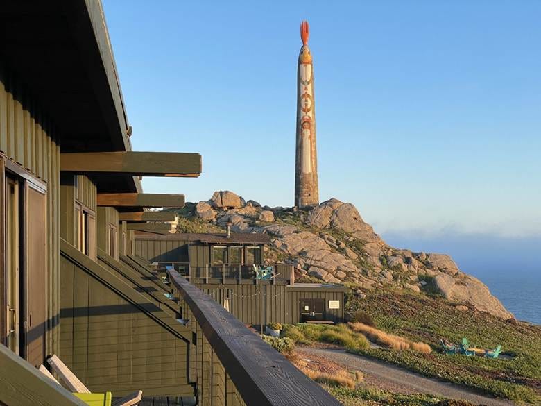 A building with a tall tower on top of a hill

AI-generated content may be incorrect.