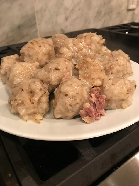 Making and serving the Norwegian dish of kumla