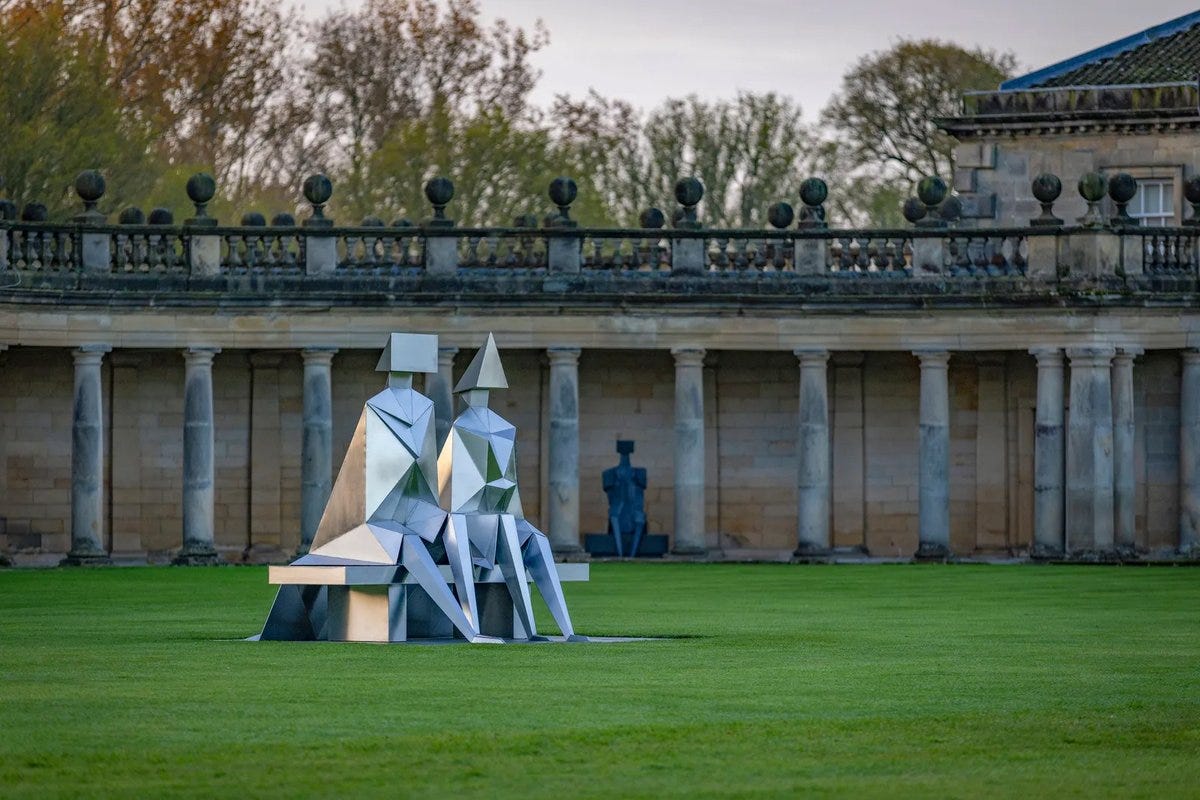 Lynn Chadwick’s Sitting Couple on Bench (1990, constructed 2021), which is part of a career retrospective at Houghton Hall in Norfolk, is running until 4 October Courtesy of the artist’s estate/Pangolin London. Photo: Steve Russell Studios Lynn Chadwick’s Sitting Couple on Bench (1990, constructed 2021), which is part of a career retrospective at Houghton Hall in Norfolk, is running until 4 October Courtesy of the artist’s estate/Pangolin London. Photo: Steve Russell Studios