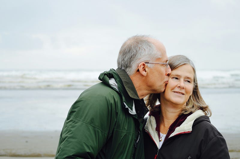 a middle aged couple at the beach a middle aged couple at the beach