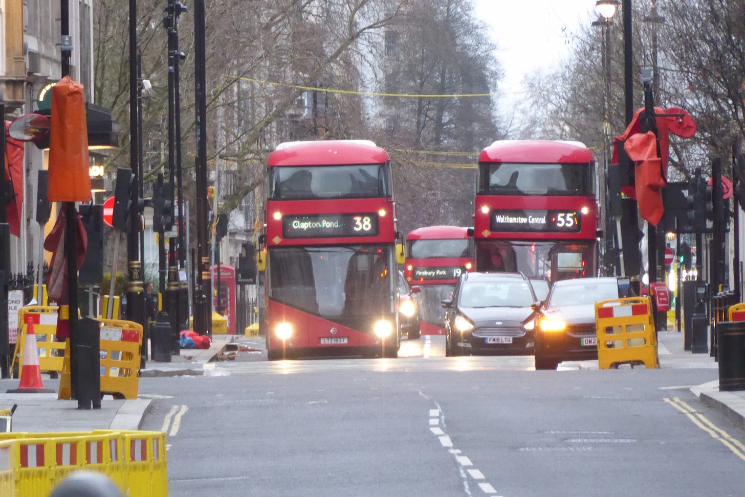 Double-decker buses on Mortimer Street.