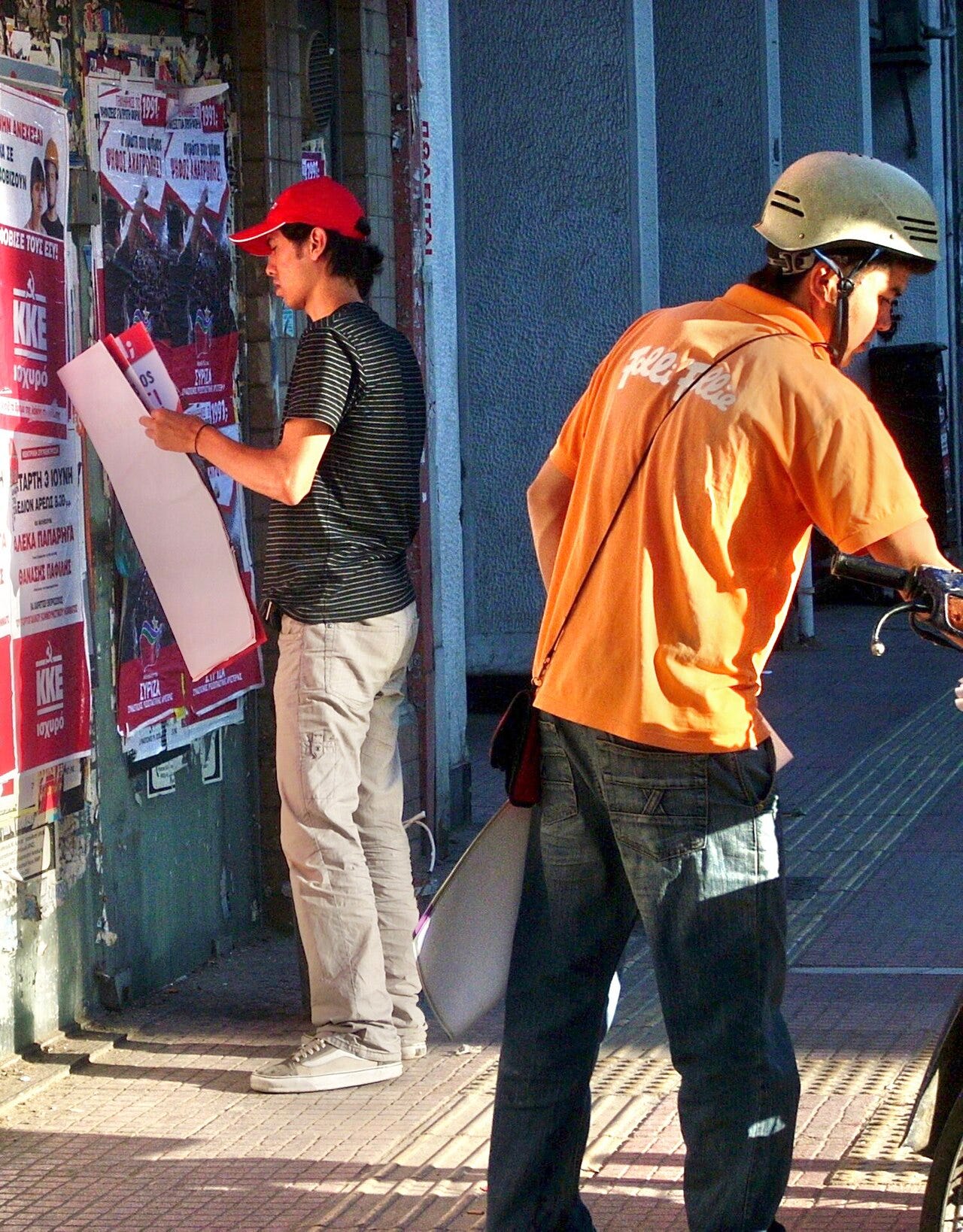 Photo: Grzegorz Wysocki / Wikimedia Commons (CC BY 3.0) Billstickers placarding – political campaign before the European Parliament election in Greece (2009) – Patission Street in Athens