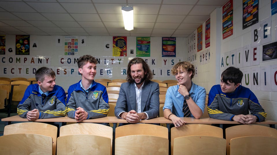 The Earth Foundation's founder, Peter McGarry, and students from his former high school. The Earth Foundation's founder, Peter McGarry, and students from his former high school.