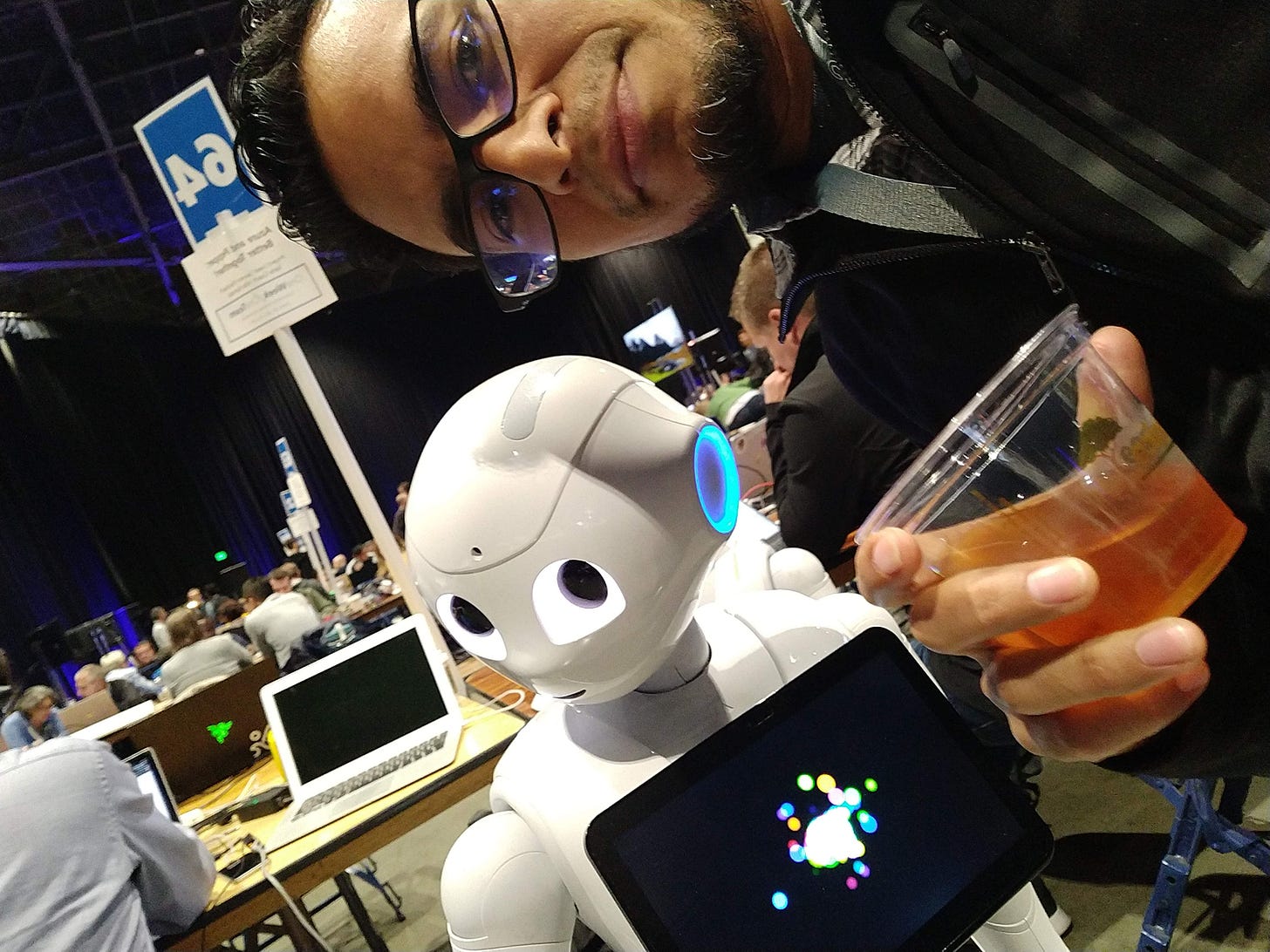 Maho Pacheco with Pepper the robot