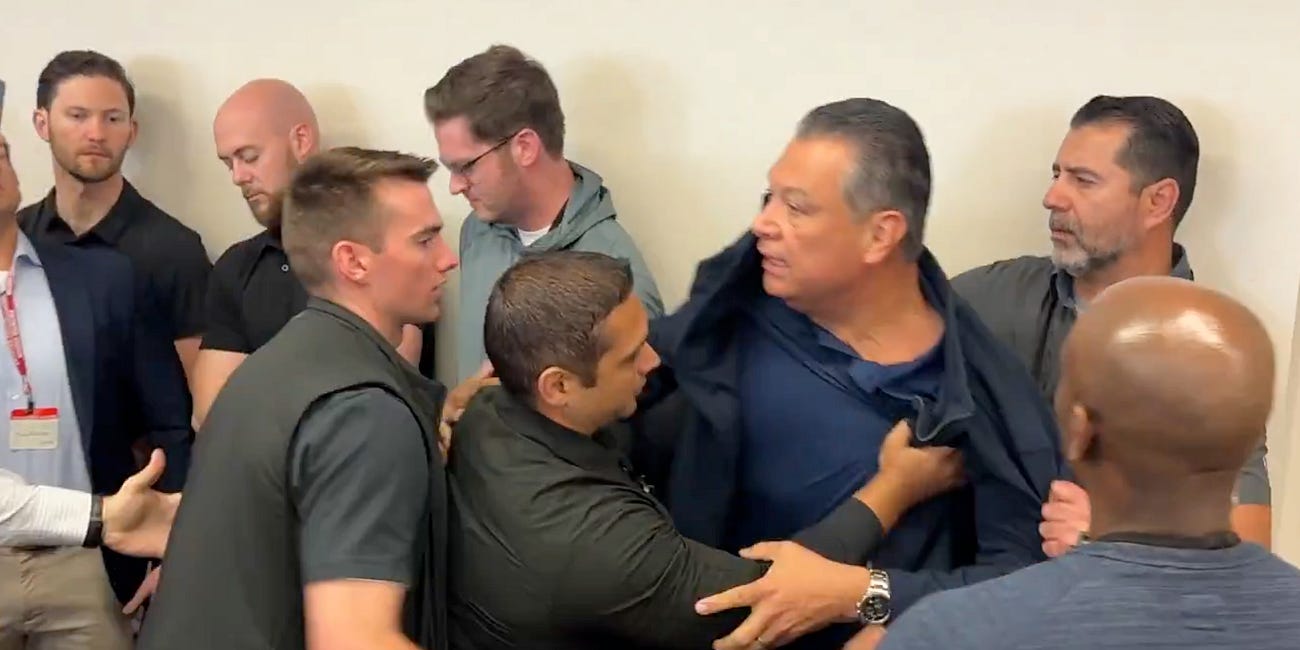 Senator dragged from press conference in stunning display of regime force