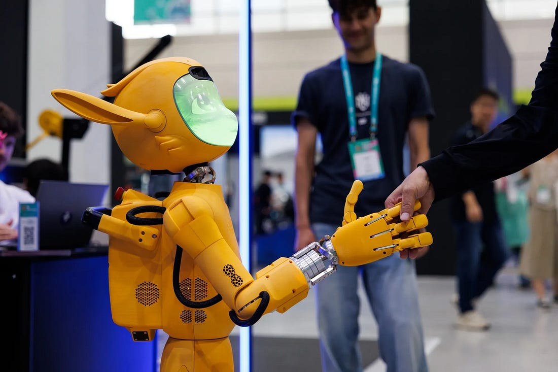 A humanoid robot at the Seoul AI Robot Show 2025 extends its hand to greet a human visitor, symbolizing collaboration between humans and intelligent machines. A humanoid robot at the Seoul AI Robot Show 2025 extends its hand to greet a human visitor, symbolizing collaboration between humans and intelligent machines.