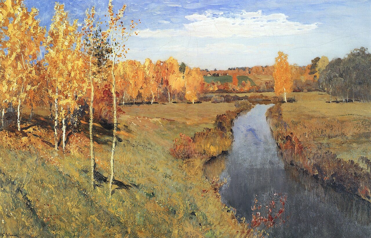A river between golden birch trees under a soft blue sky A river between golden birch trees under a soft blue sky