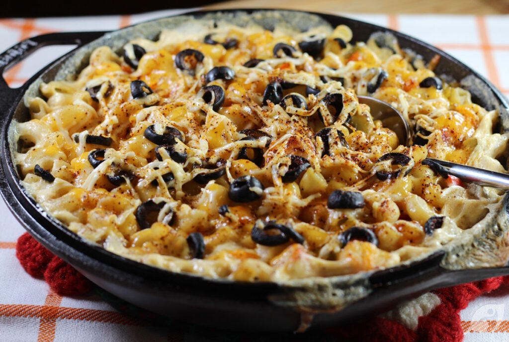 Smoke and grill-bake for approximately 20-25 minutes or until the mac and cheese is lightly browned and bubbly around the edges and the cheese is melty. Smoke and grill-bake for approximately 20-25 minutes or until the mac and cheese is lightly browned and bubbly around the edges and the cheese is melty.