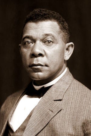 Close-up portrait of Washington in a light brown textured suit with a white collared shirt and black bow tie.
