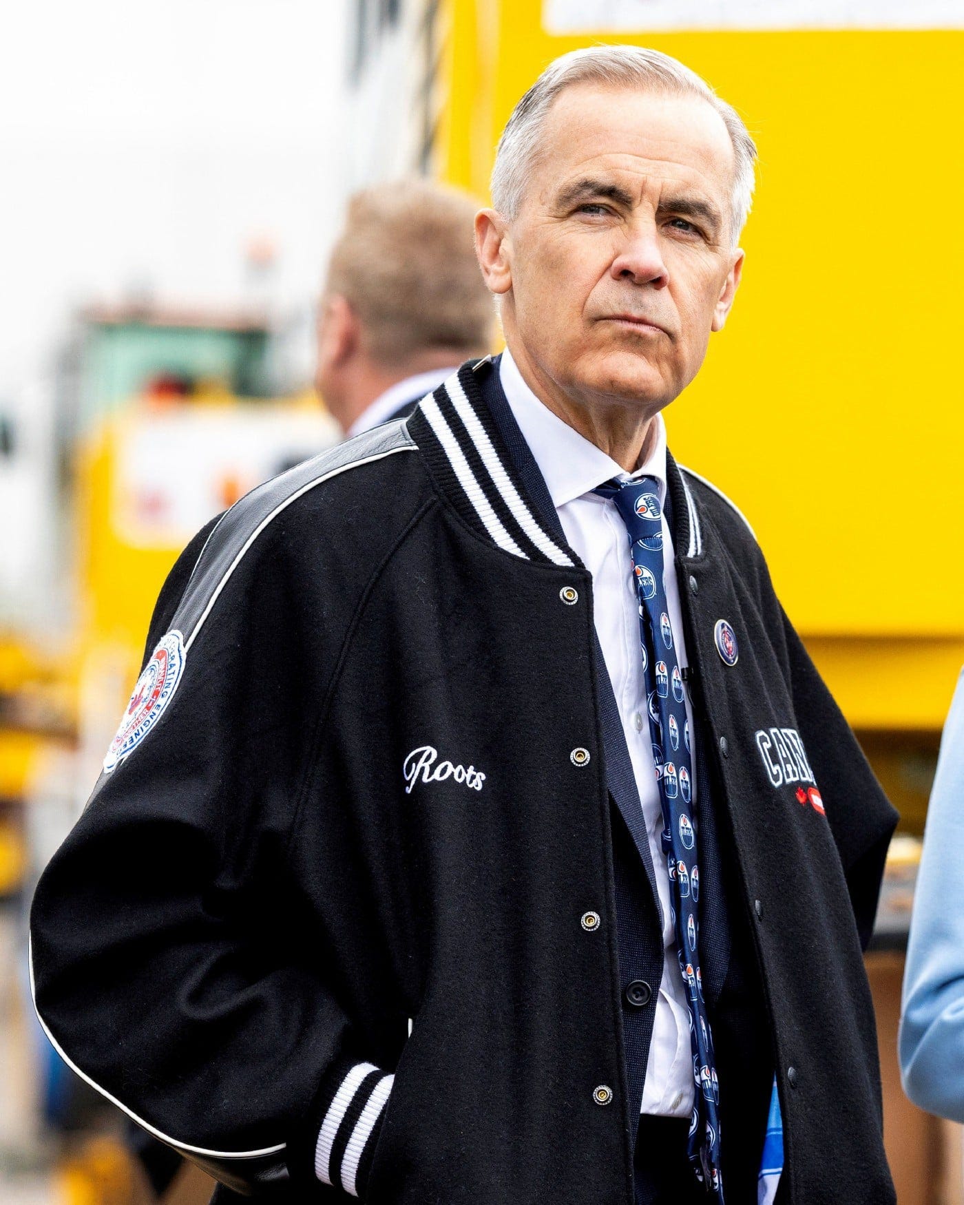Canada's Prime Minister Mark Carney looks on as he tours the International Union of Operating Engineers Local 793 training campus in Oakville, Ontario, Canada April 30, 2026. REUTERS