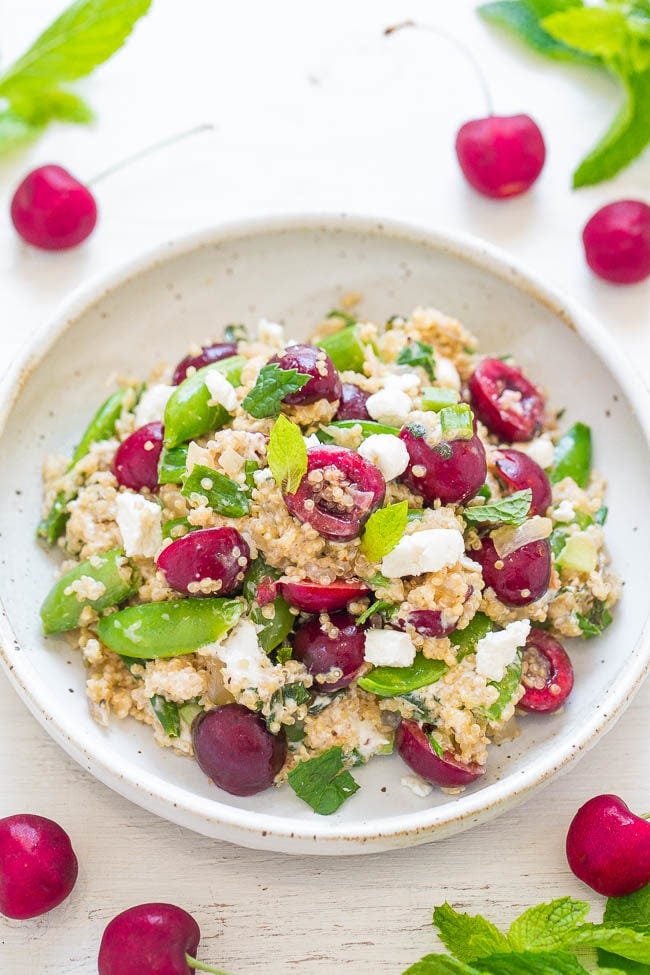 Quinoa, Cherry, and Goat Cheese Salad - Healthy, EASY, and loaded with juicy cherries, tangy goat cheese, snap peas, mint, and more!! The PERFECT light yet satisfying salad with so many great flavors!! Quinoa, Cherry, and Goat Cheese Salad - Healthy, EASY, and loaded with juicy cherries, tangy goat cheese, snap peas, mint, and more!! The PERFECT light yet satisfying salad with so many great flavors!!