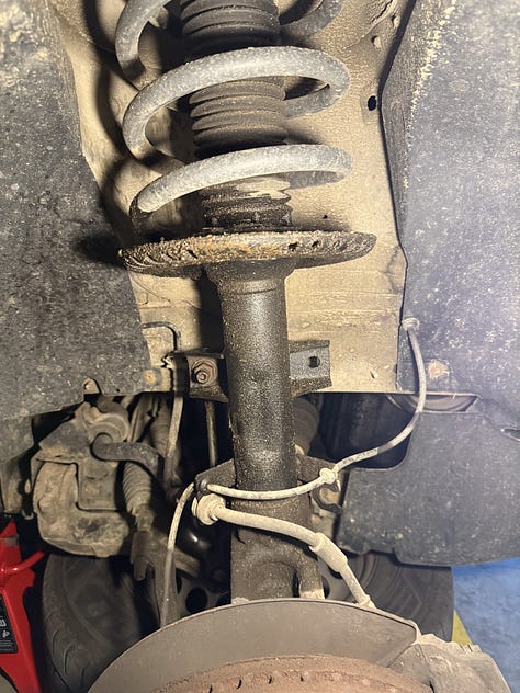 removing a broken suspension strut vw t5 replacement video