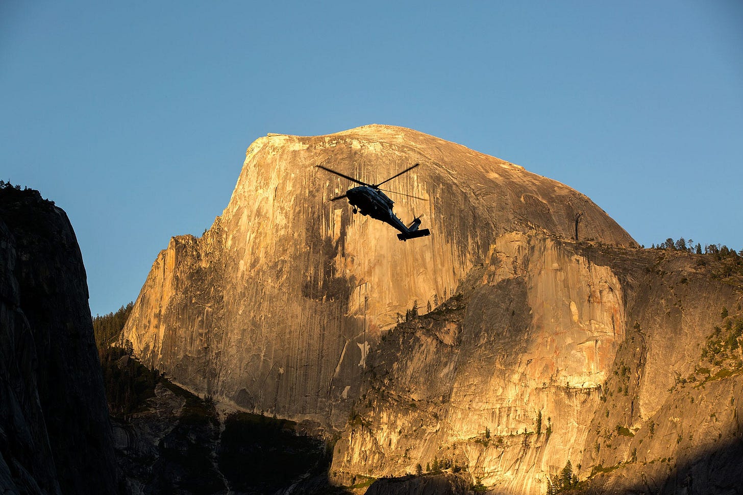 June 17, 2016: As Marine One approaches Yosemite National Park, a stunning view of Half Dome, illuminated by the setting sun, welcomes the President's arrival. June 17, 2016: As Marine One approaches Yosemite National Park, a stunning view of Half Dome, illuminated by the setting sun, welcomes the President's arrival.