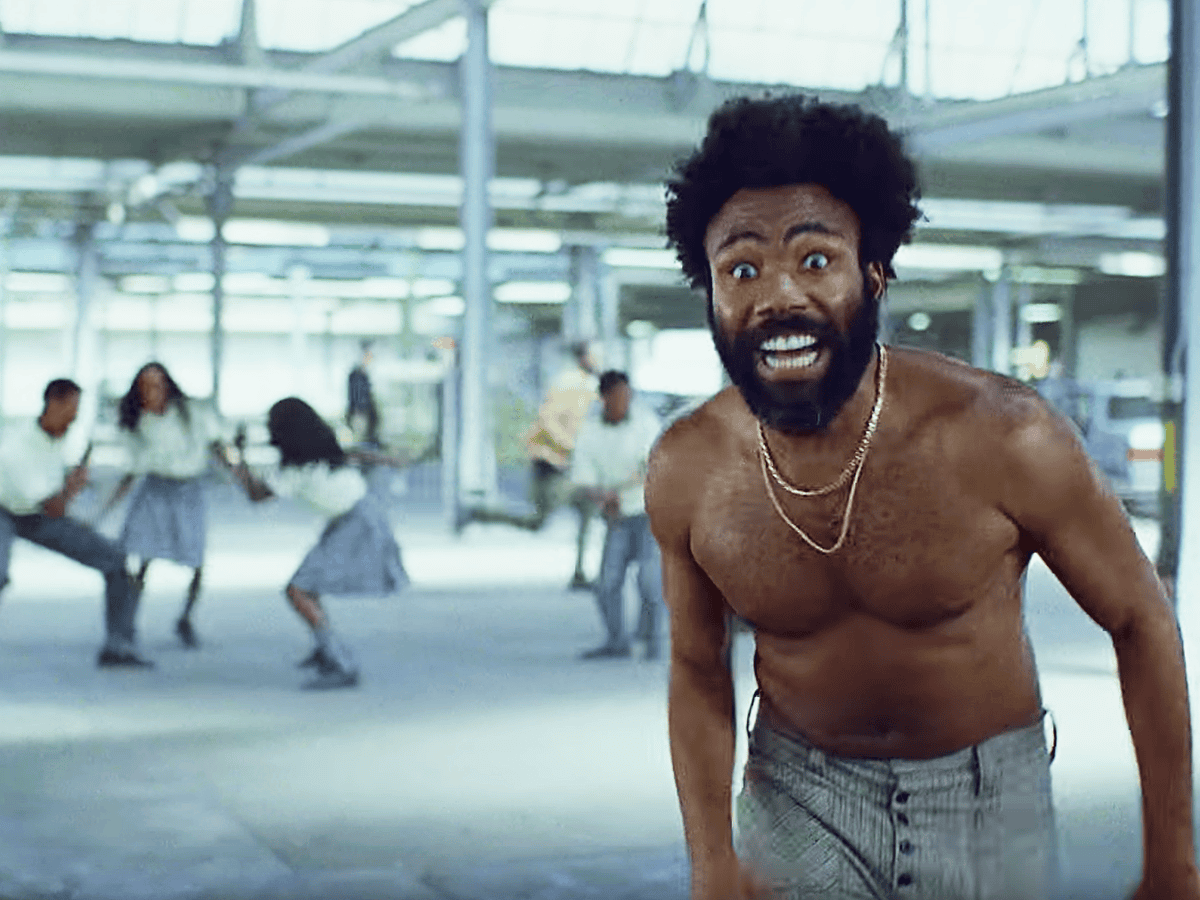 This is America: theories behind Childish Gambino's satirical masterpiece | Childish Gambino | The Guardian This is America: theories behind Childish Gambino's satirical masterpiece | Childish Gambino | The Guardian