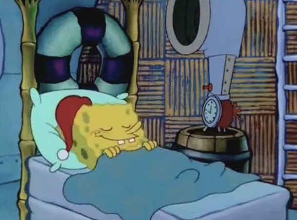 This may contain: the spongebob is sleeping in his bed