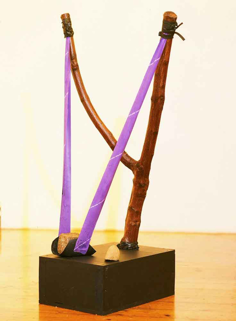 Laila Shawa, Weapons Of Mass Destruction, (wood, ribbon, and stone), 2002 [Jordan National Gallery of Fine Arts, Amman. © Laila Shawa]