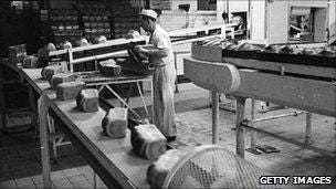 25th November 1965: A line of baked loaves ready to be packed at the Wonderloaf Bakery, Tottenham, north London. 25th November 1965: A line of baked loaves ready to be packed at the Wonderloaf Bakery, Tottenham, north London.