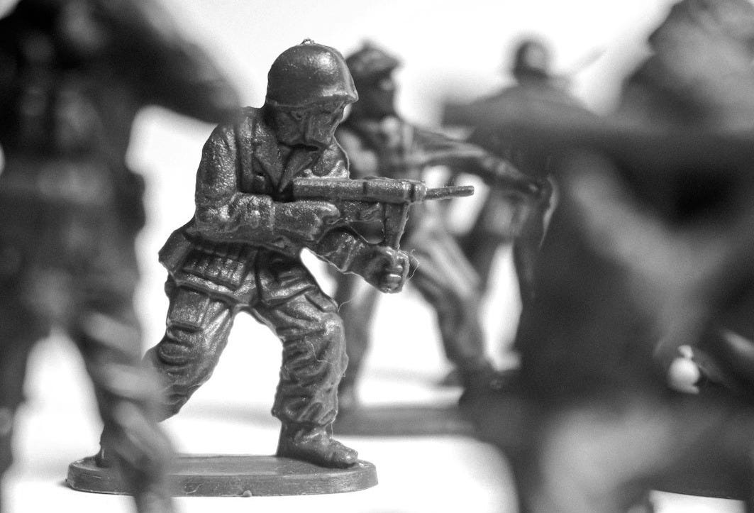 Toy soldiers in a battle formation