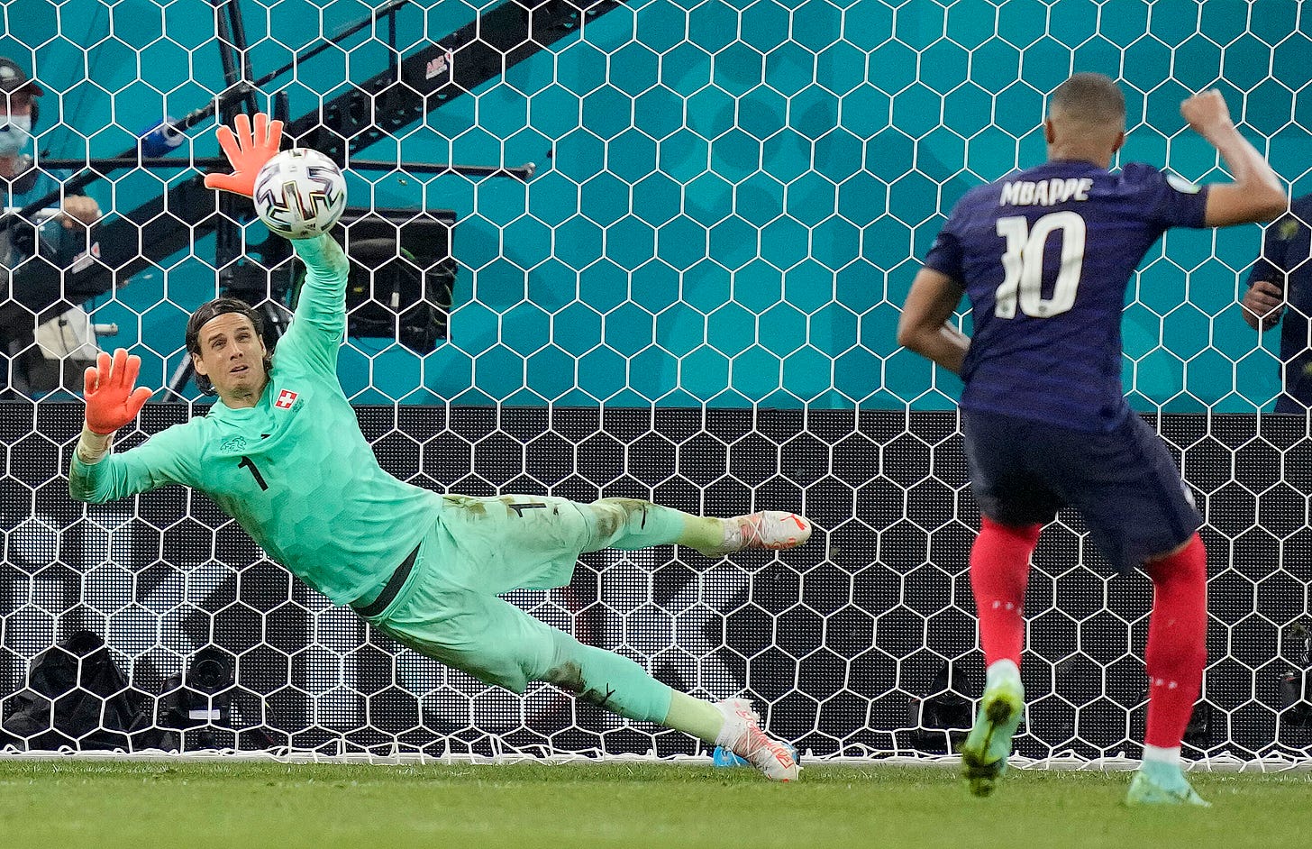 Watch Switzerland hero Yann Sommer refuse to celebrate after key Kylian Mbappe penalty save over VAR fears before check | The Sun Watch Switzerland hero Yann Sommer refuse to celebrate after key Kylian Mbappe penalty save over VAR fears before check | The Sun