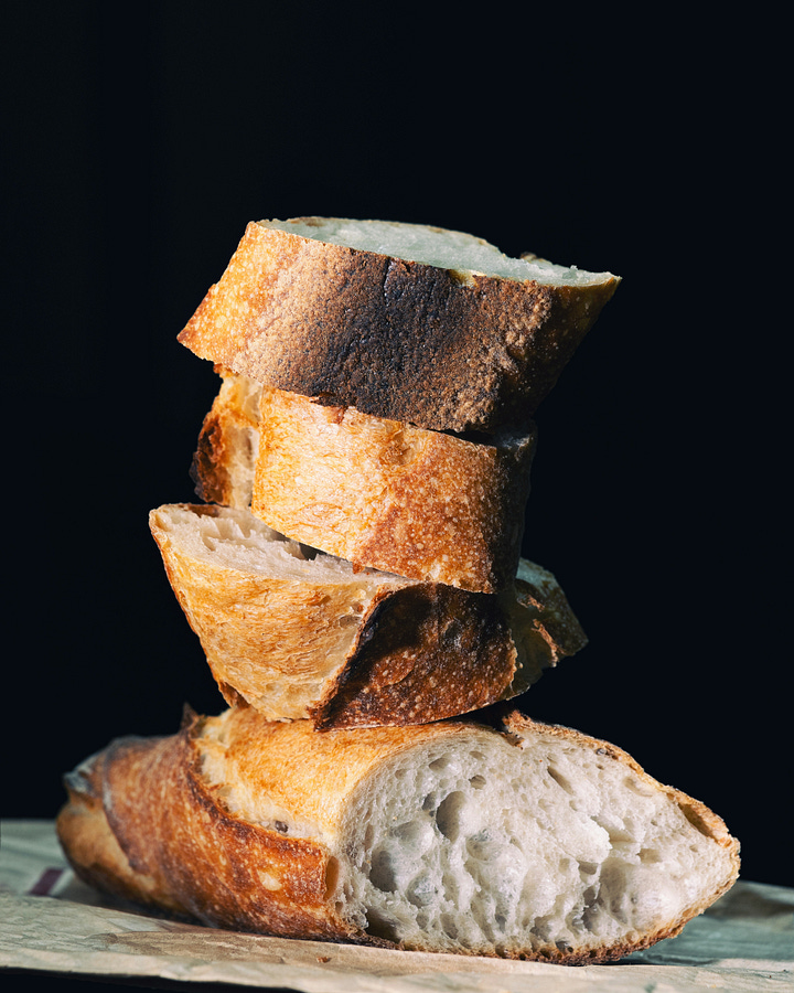 Blackberries on the vine. Sliced baguette. Photos by Richard Lin and Rodolfo Marqes via Unsplash.