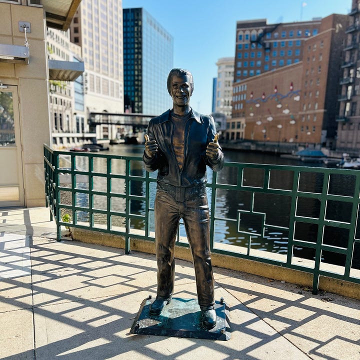 river, walkway, sculptures