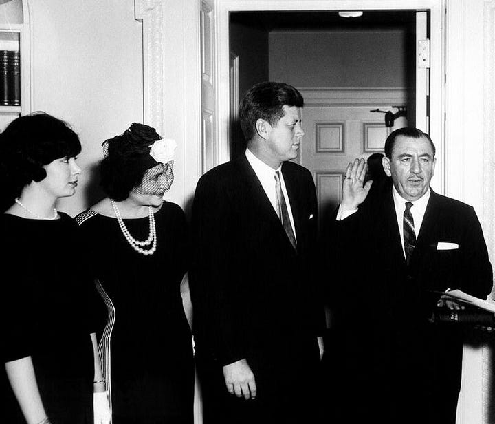 Nancy Pelosi, neé D'Alesandro, far left, in the Oval Office with her mother and JFK as her father was being sworn in to the Renegotiations Board in 1961. Right: Pelosi and JFK on another occasion.