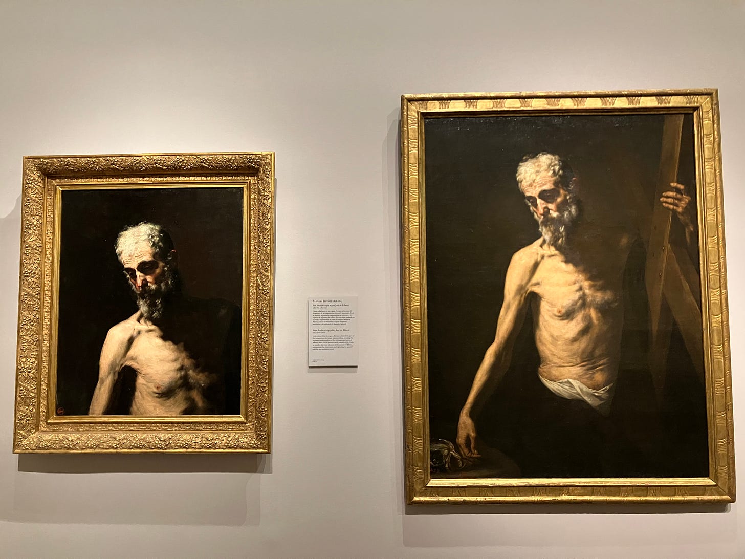 side by side paintings of a bearded old man with naked torso looking down at the ground against a black background. side by side paintings of a bearded old man with naked torso looking down at the ground against a black background.