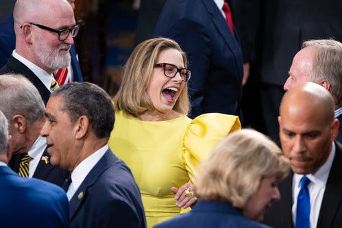 Sen. Kyrsten Sinema (I-Ariz.) is seen on the House floor before President Joe Biden's State of the Union address.