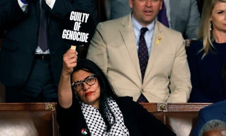 Rashida Tlaib holds 'war criminal' sign as Netanyahu addresses Congress –  video | Rashida Tlaib | The Guardian
