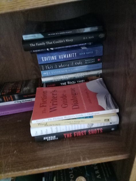 Photos of piles of books on all kinds of subjects, mostly either fiction or popular science
