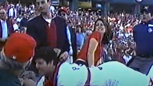 A group of people in a stadium

AI-generated content may be incorrect.