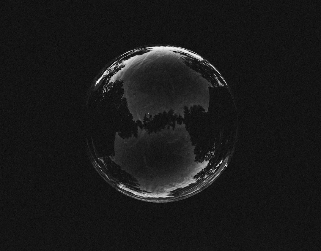 grayscale photo of moon and stars