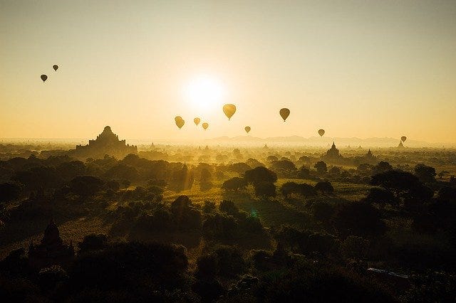 sunrise with hot air balloons, to depict employee experience rising sunrise with hot air balloons, to depict employee experience rising