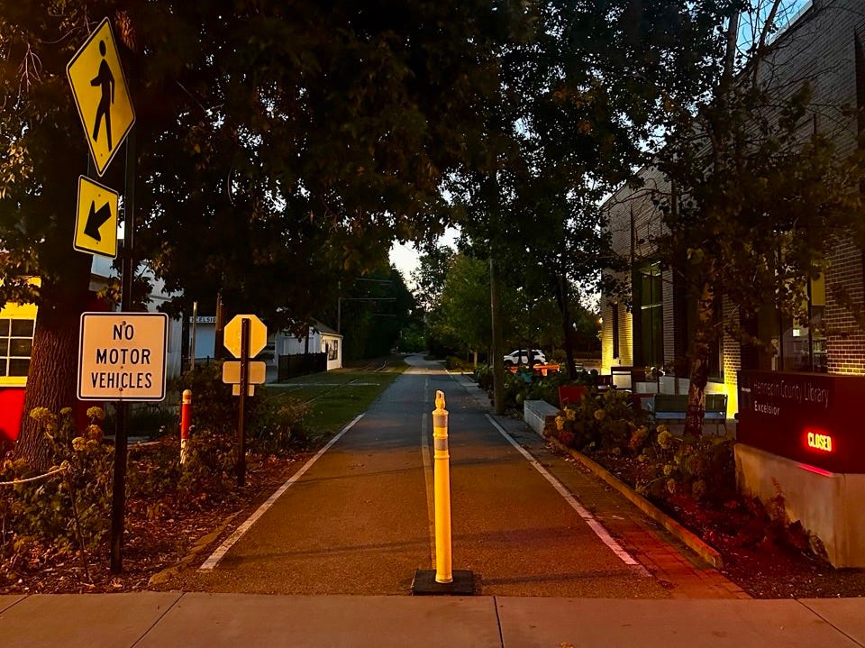 A street with signs on it
Description automatically generated A street with signs on it
Description automatically generated