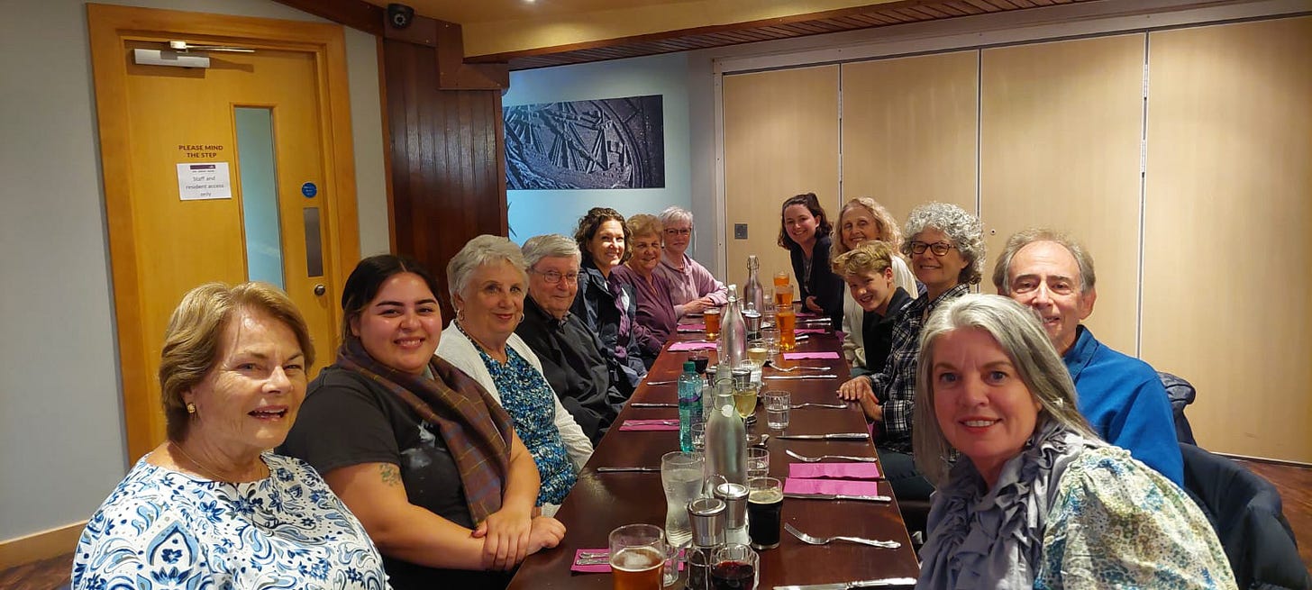 2025-6-25 Our group at dinner, photo by Tanya Briley
