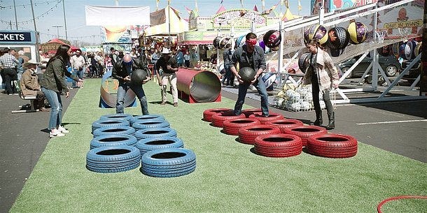 Cordell Walker has Cassie guide him through red tires while holding a big ball 2.14. Cordell Walker has Cassie guide him through red tires while holding a big ball 2.14.