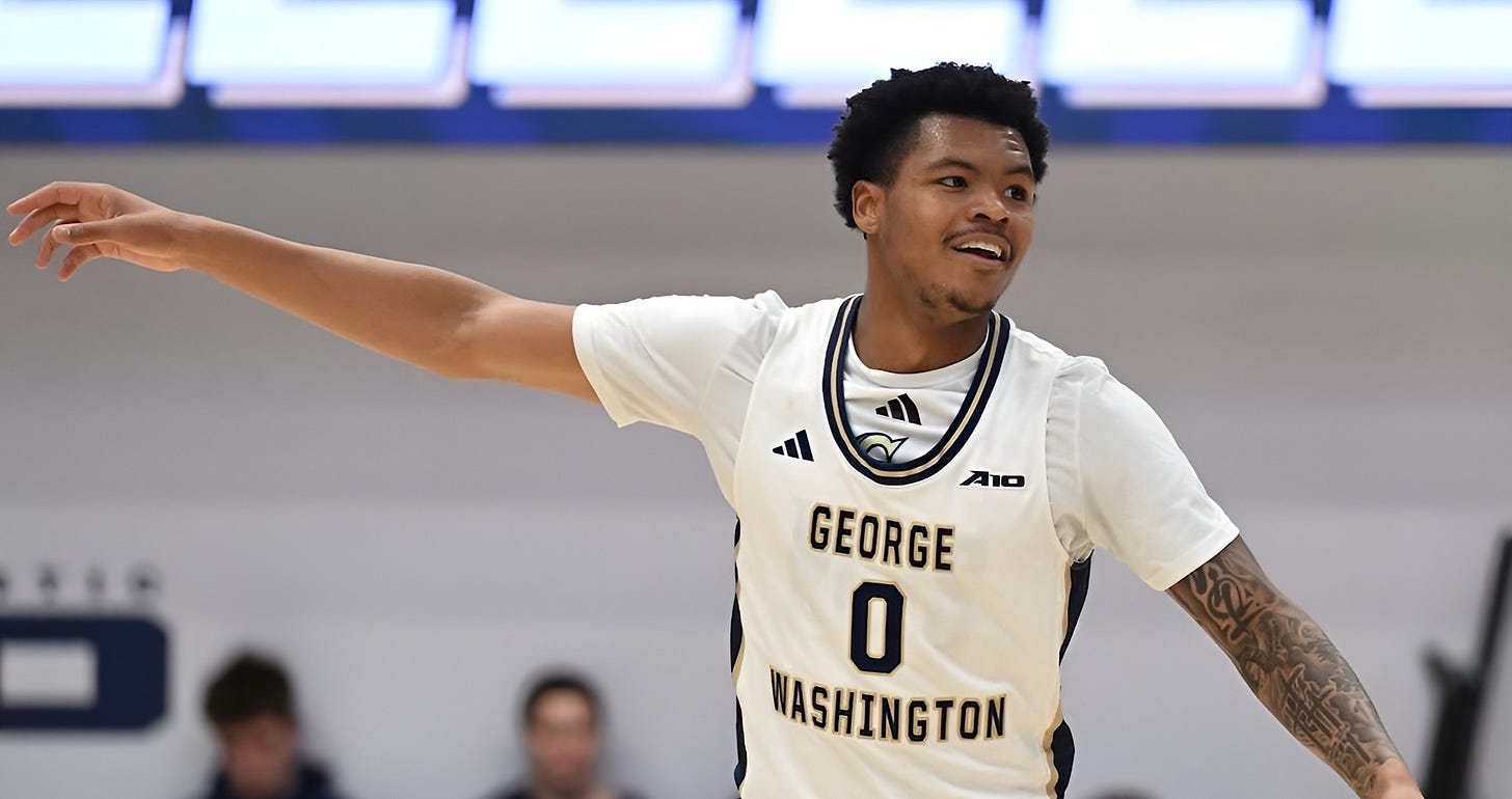 Trey Autry celebrating after scoring a basket while playing for George Washington