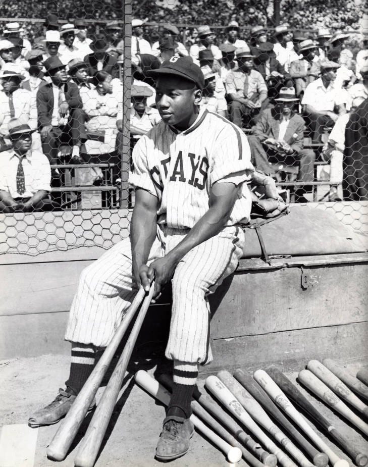 r/baseball - a baseball player sitting on a bench with bats